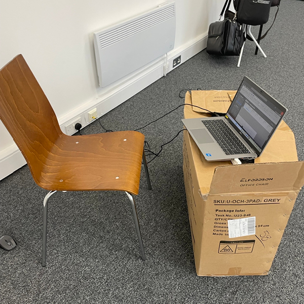 For the first weeks, Darren used an old cardboard box as his work desk_600x600.jpg